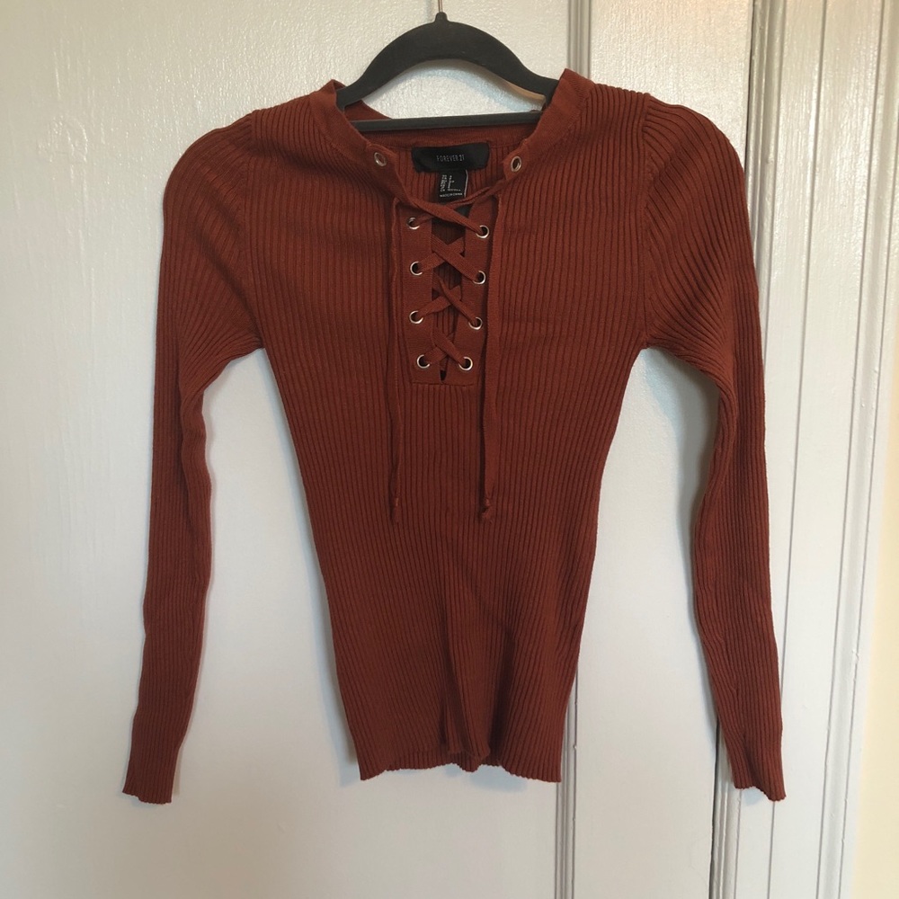 Burnt orange lace up ribbed top